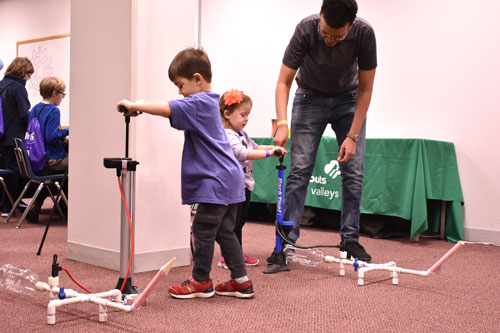 kids launching rockets at Tech Fest